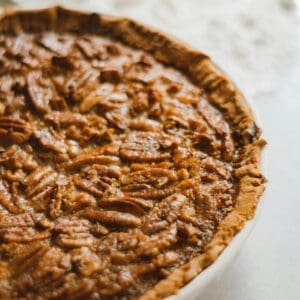 A freshly baked pecan pie with a golden crust.